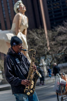 Sax player on the Magnificient Mile, Chicago, March 2012