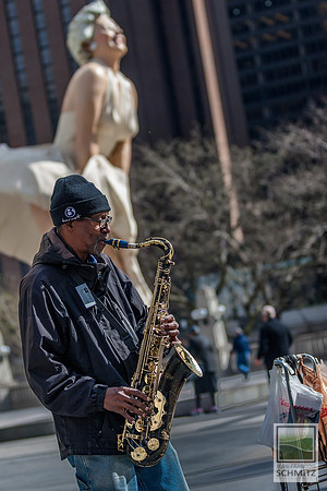 Sax player on the Magnificient Mile, Chicago, March 2012